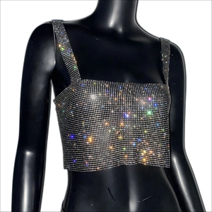 Macro shot of colorful rhinestones on a luxury crop top showing sparkling texture details