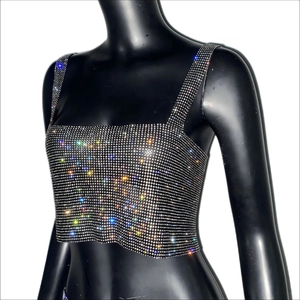 Macro shot of colorful rhinestones on a luxury square neck crop top party vest