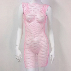 Detail of pink rhinestone mesh dress fabric with sparkly crystals on net material