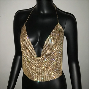 Detail of gold rhinestone halter top with sparkling metal chainmail sequins