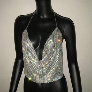 Detailed view of silver rhinestone halter top featuring V-neck and metallic mesh chain