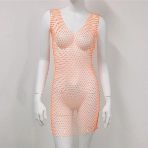 Close-up of orange rhinestone mesh mini dress with deep V-neck and sparkling sequins