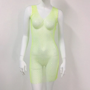 Detail of neon green rhinestone mesh fabric with hollow-out see-through texture