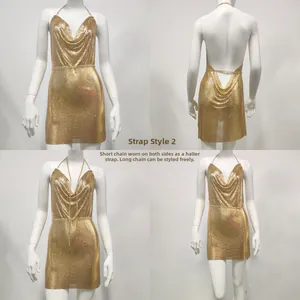 Close-up of gold metal sequin dress featuring adjustable chain straps and mesh texture