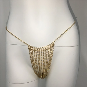 Detailed view of sexy gold body chain with shimmering rhinestones for women bikini wear