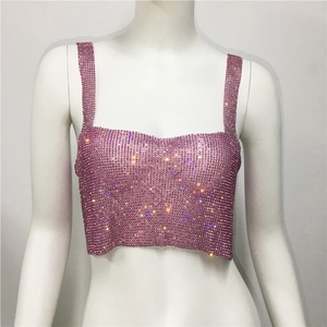 Close-up of sparkling pink rhinestone metal mesh crop top with square neckline