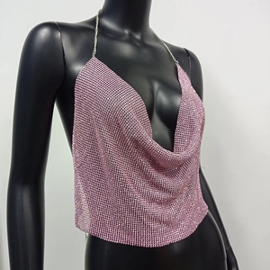 Detail of pink rhinestone mesh halter top with metal chain and shimmering crystals