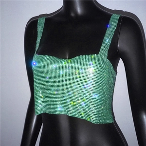 Close-up of bright green rhinestone crop top with square neckline and wide straps