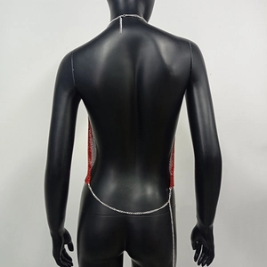 Detailed back view of red metallic mesh halter top with silver chain straps and open back