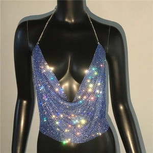 Detail of blue rhinestone mesh halter top with sparkling crystals and deep V-neck