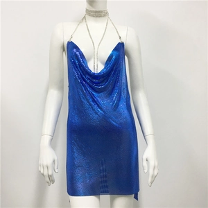 Detailed view of royal blue metal sequin mesh fabric with draped halter neck design