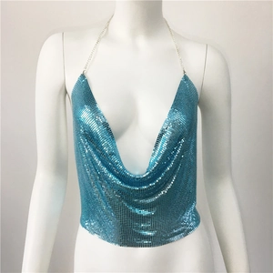 Detail of bright blue metal mesh halter top with deep V-neck and sequins texture