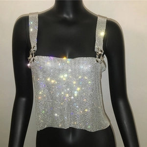 Detail of silver rhinestone mesh crop top with wide straps and metal spring buckles