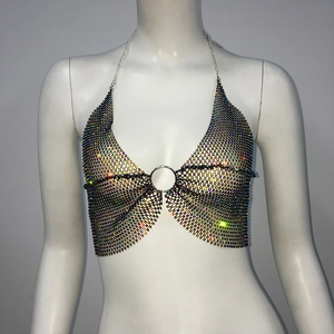 Detail of metallic mesh rhinestone bikini top with sparkling crystals and silver ring link