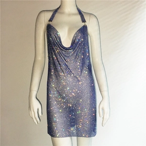 Close-up of sparkling light blue sequin mesh dress with halter neck and crystal detailing