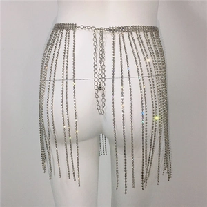 Macro shot of silver metallic fringe waist chain with high-density sparkling rhinestones
