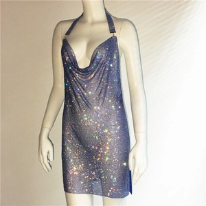 Detailed view of iridescent purple metal mesh fabric with shimmering rhinestones