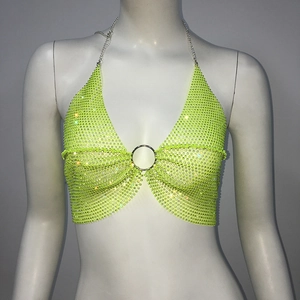 Close-up of neon green rhinestone halter top with metal chain straps and center O-ring