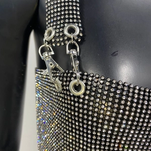 Detail of rhinestone mesh top showing silver metal lobster clasp and crystal embellishments
