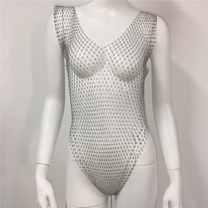Detailed close-up of rhinestone mesh body chain with shimmering silver crystal grids