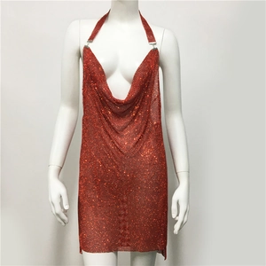 Detailed view of sparkling red rhinestone halter dress with deep V-neck and mesh texture
