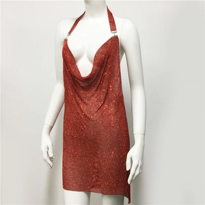 Detail of red metallic mesh halter dress featuring a deep V cowl neck for party wear