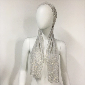 Close-up of sparkling silver rhinestone headscarf with metallic mesh for party wear