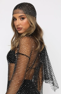 Detail of black rhinestone fishnet headscarf and matching mesh shawl for party wear