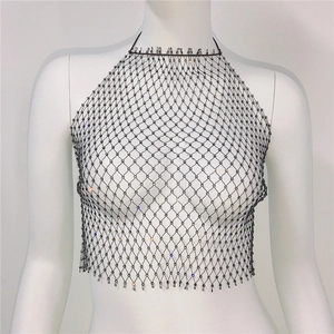 Detail of black mesh halter top with colorful rhinestones on a white mannequin