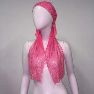 Detailed macro view of pink elastic mesh headscarf with glittering rhinestones