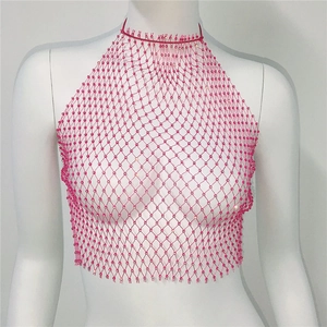 Detail view of pink beaded mesh halter top featuring intricate lattice and shimmering beads