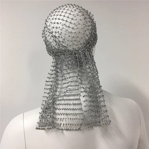 Detailed view of silver rhinestone mesh headpiece with long tassel drape design