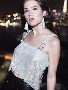 Sparkly silver sequin crop top with large triangle earrings for women night out party