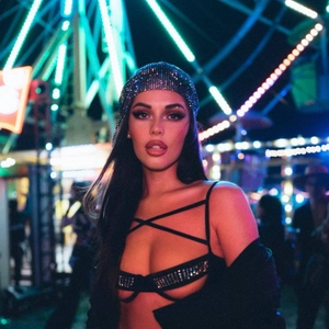 Fashionable mesh headscarf with sparkling rhinestones and matching crystal crop top