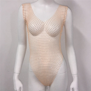Detail of sheer mesh rhinestone bodysuit with deep V-neck and sparkling crystal accents