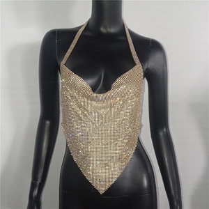 Detailed view of champagne gold rhinestone halter top with V-neckline and pointed hemline