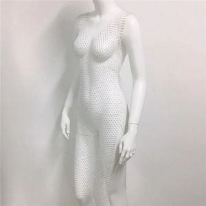 Detail of silver rhinestone mesh dress with V-neck and sparkling crystal grid design