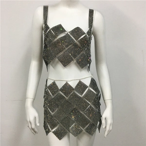 Detail view of rhinestone mesh silver metal chain dress for sexy party wear