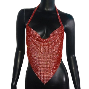 Close-up of red sequin halter top with sparkling rhinestones and metal mesh detail