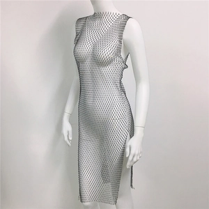 Detailed view of black rhinestone fishnet mesh fabric with sparkling crystal accents