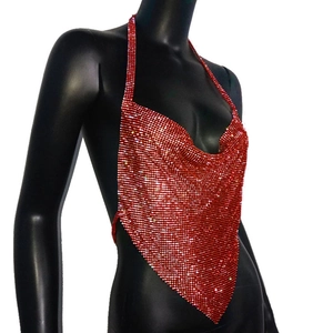 Detail of red rhinestone halter top with draped neckline and metallic shimmer finish