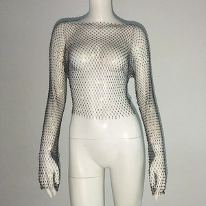 Close-up of black fishnet long sleeve top featuring sparkling hand-set rhinestones