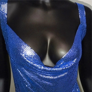 Detail of royal blue metal sequin chainmail fabric on a backless strapless dress