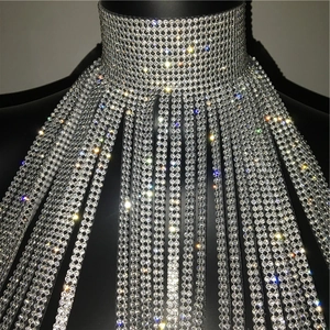 Close-up of sparkling rhinestone choker with dangling fringe tassels for party wear