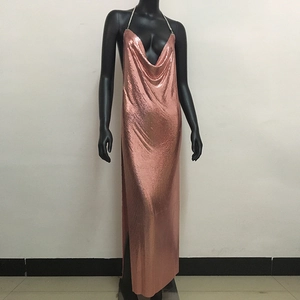 Detail of rose gold sequin dress showing deep V-neck and sparkling metallic mesh fabric