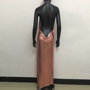 Detail of rose gold sequin backless dress showing metal chain and backless design