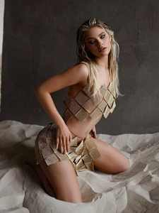 Sparkly gold diamond-shaped rhinestone two-piece set featuring tube top and mini skirt