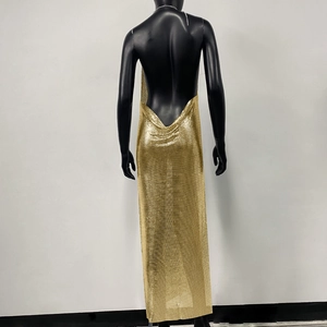 Detailed back view of gold metal mesh backless dress with sequins for party wear