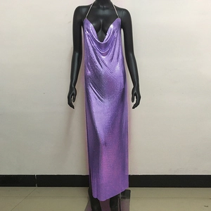 Detail of purple metallic sequin dress with deep V-neck and metal chain halter neck