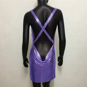 Detailed back view of purple metallic sequin mini dress with criss-cross straps